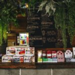 bar with sweets and water decorated with plants